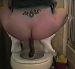 A classic GirlsPooping.Com model squats over the toilet bowl to take a nice, long dump that she held in all day!